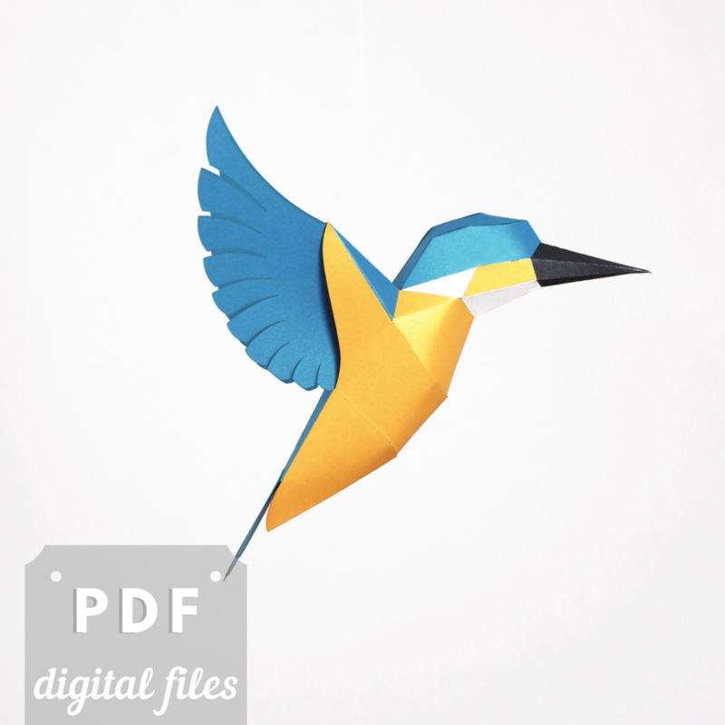 Kingfisher blue paper art. Low poly bird sculpture.