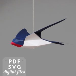 Swallow bird papercraft sculpture. Low poly bird