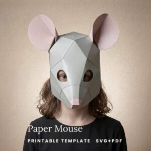 paper-mouse-mask-template-smaga-paperwood Hero (worn) — Low-poly paper mouse mask in grey and pink card, worn by a child as a half-mask